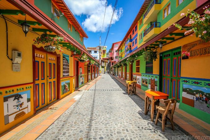 Amazing Private Guatape Tour + Boat Ride + Helicopter & Rock - Guatapé’s Malecón and the zócalo façades