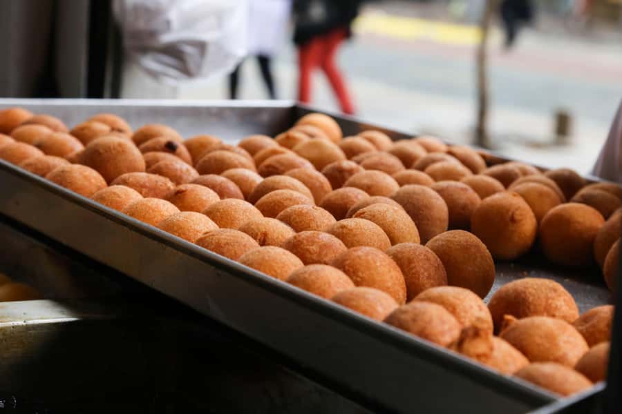 Bogota Food Tour with over 12 Tastings & Tejo - Walking Old Town with a guide