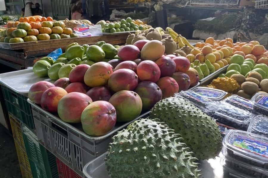 Cali: Fruit Market Walking Tour with Tastings - Walking from Miraflores toward Galeria Alameda