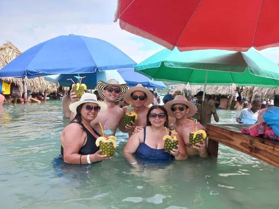 Cartagena: CHOLON & BARU with lunch - Four hours in Cholón: boats, palm shelters, and a social crowd