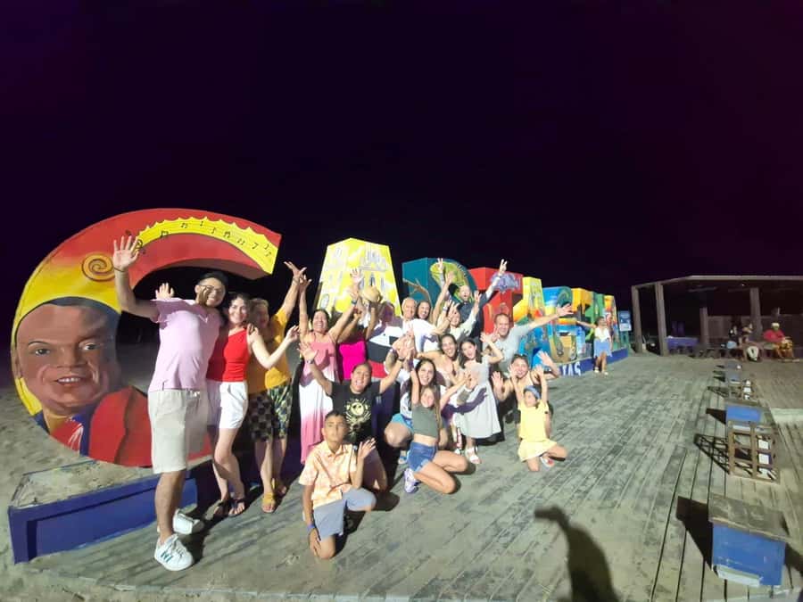Cartagena: Night party in authentic Colombian chiva with entertainer - Old Shoes Monument: the best photo stop
