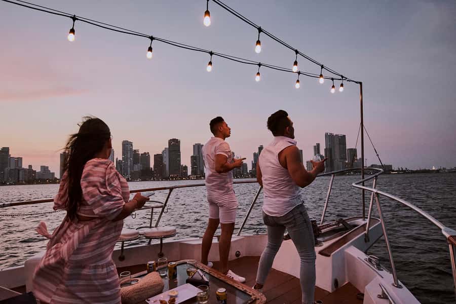 Cartagena: Sunset Cruise with Open Bar - Setting sail past Bocagrande and the lighthouse