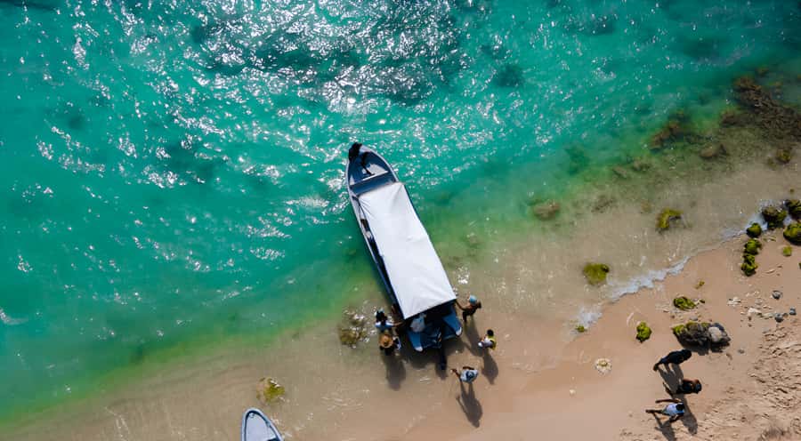Cartagena: Tour to Playa Tranquila with Snorkeling + Luminous Plankton and Parasol - The boat ride toward Playa Tranquila