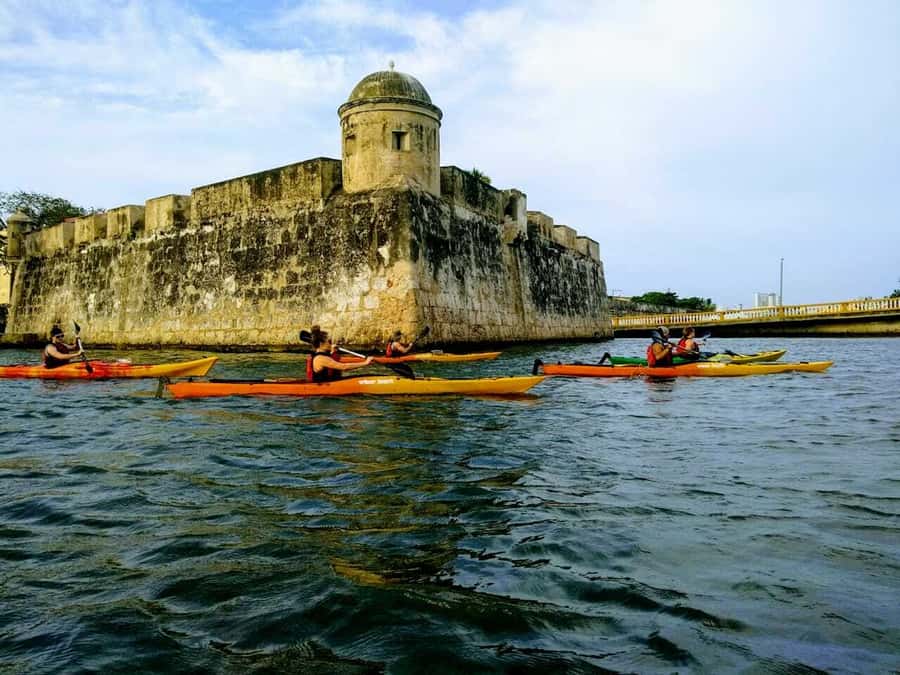 Cartagena: Walled City Kayak Tour - Crossing the channel toward the clock tower