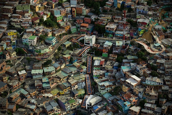 Comuna 13 & Downtown: From violence to innovation - Riding Medellín by Metro, Cable Car, and Bus