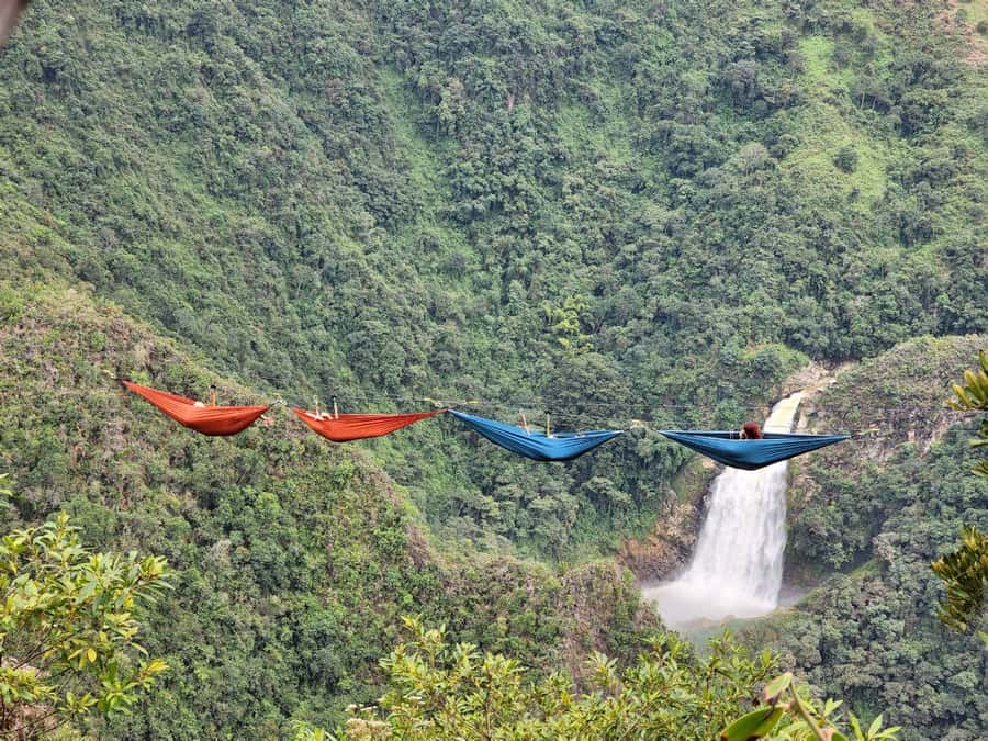 From Medellín: Dream Hammocks, Zipline, & Waterfall Day Trip - The first zipline flight across two sections