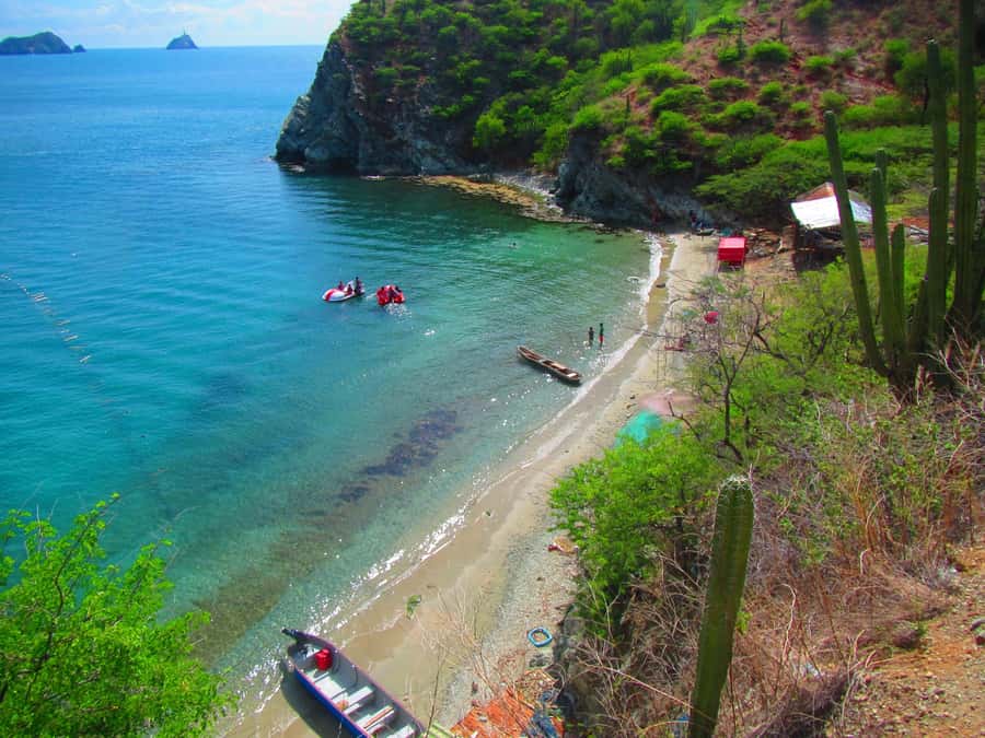 From Santa Marta: Sisiguaca Beach Hike with Snorkeling - Walking the coastal trail to Sisiguaca