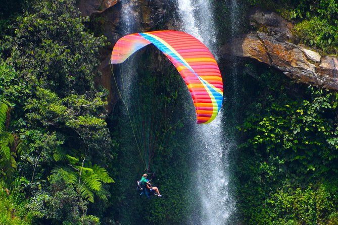 Fun RAFTING + Awesome PARAGLIDING over giant waterfalls from MEDELLIN - Up to 25 minutes above Cocorná’s waterfalls
