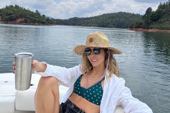 Guatape and El Peñol town and dam tour from Medellin - Seeing the dam from a private boat