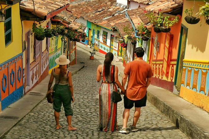 Guatape & Horse Ride & El Peñol Rock & Quaint Town From Medellin - Guatapé town, painted details, and a lunch break