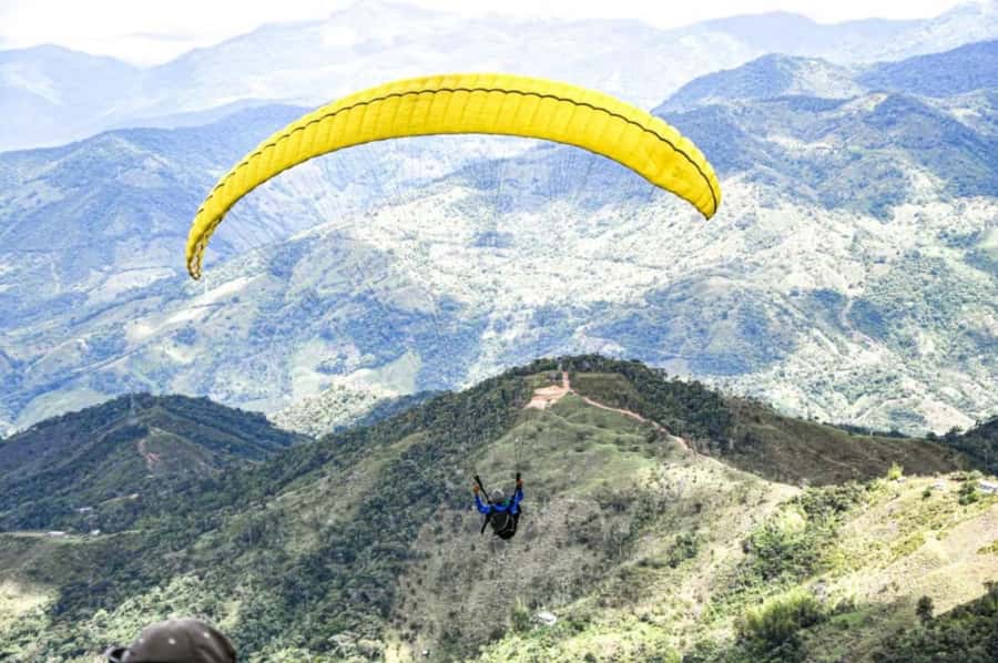 Guatape: Paragliding Experience - Safety gear and the Spanish briefing