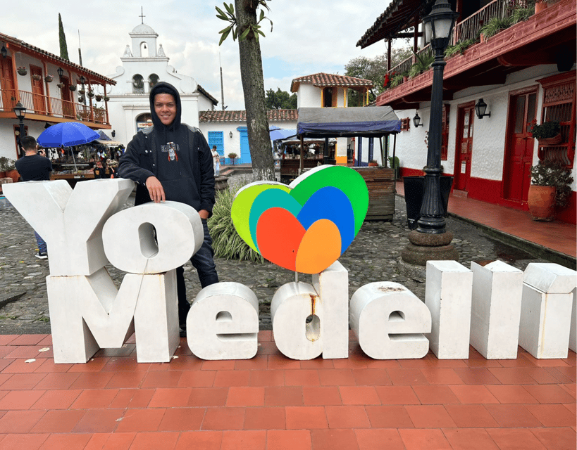 Medellín City Tour and Comuna 13 Experience - Comuna 13: murals, electric stairs, and a complicated story