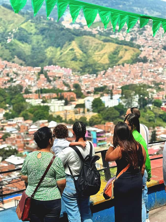 Medellín Comuna 13 local guides snacks and your own graffiti - The escalator project and a neighborhood on the move