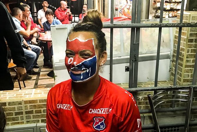 Medellín Football Tour - Drinks, face paint, and team shirts before the match