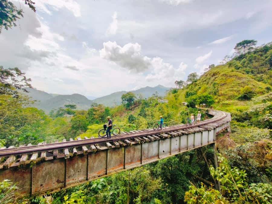 Medellín: Full-Day Mountain Bike Tour with Lunch - Riding the old railway path through Antioquia