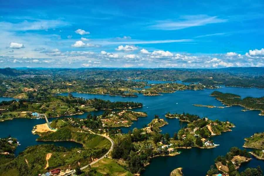 Medellin: Guatape and El Penol Rock Day Trip with Boat Ride - The Guatapé Reservoir from the water