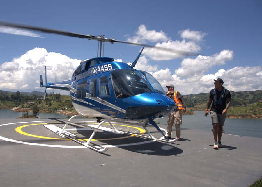 Medellín: Guatapé Private Tour with Helicopter & Boat Ride - Hotel pickup and the road from Medellín