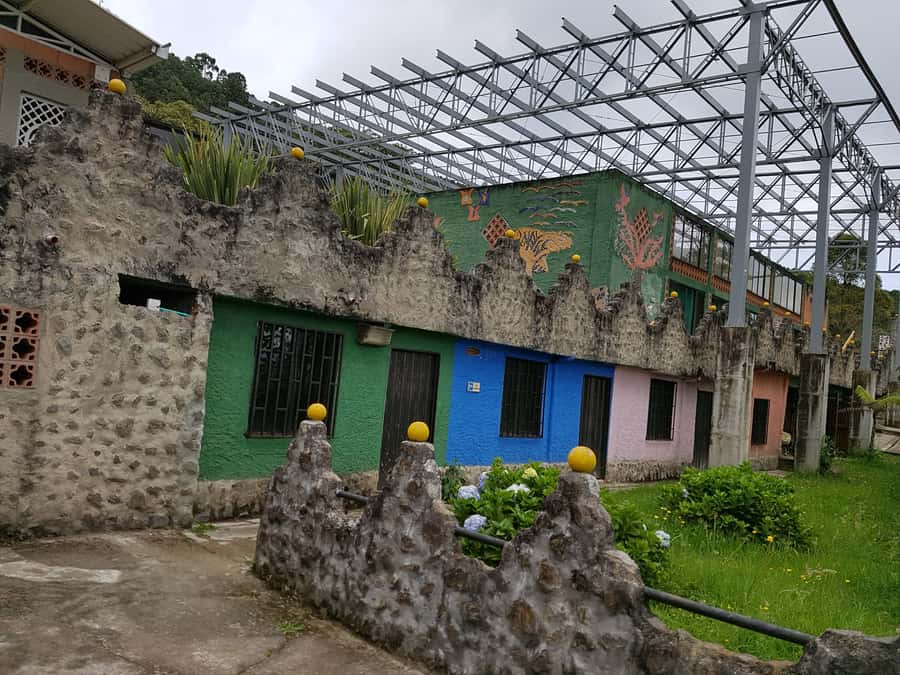 Medellín: Pablo Escobar Jail Private Tour - The Monaco building ruins and the Medellín-Cali war