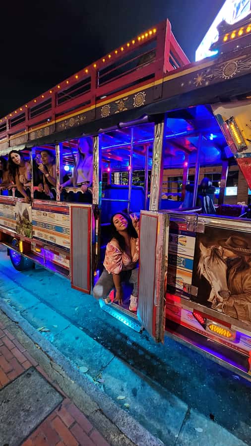 Medellin: Party Bus with DJ & Street Food Tastings - A four-hour Medellín night with a clear purpose