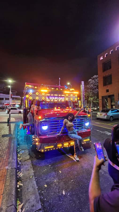 Medellin: Party Bus with DJ & Street Food Tastings - Meeting in El Poblado and getting the party started