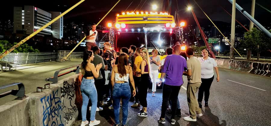 Medellin: Rumbero Party Bus with all the beer you can drink - Puente de la 4 Sur: architecture with a party soundtrack