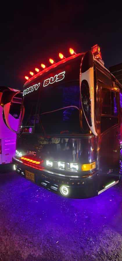 Medellin: Rumbero Party Bus with all the beer you can drink - Milla de Oro Avenue and Medellín’s polished side