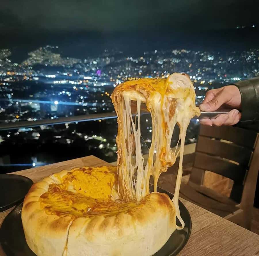 Medellin: tasting Street Food with Rooftops of El Poblado - Empanaditas El Poblado brings the crunch