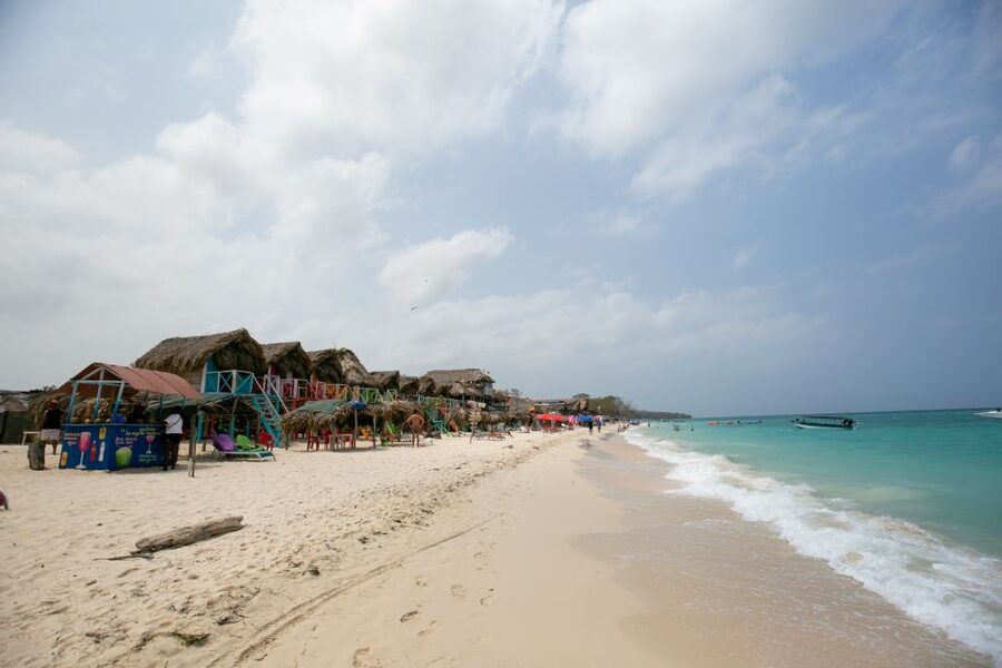 Playa Blanca Full-Day Trip from Cartagena - Leaving Cartagena through Manga and Mamonal