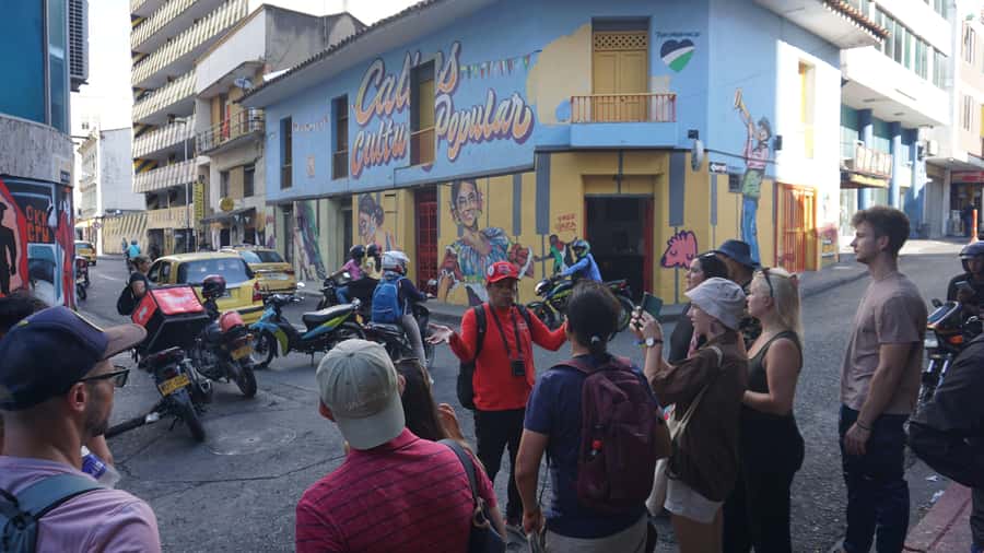Shared Tour Cali's Salsa, Graffiti & Resistance Experience - Meeting the red umbrellas at Plazoleta Jairo Varela