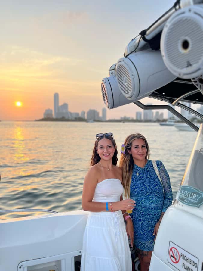 Sunset Party open bar on the bay while sharing with locals - Sunset from the sea