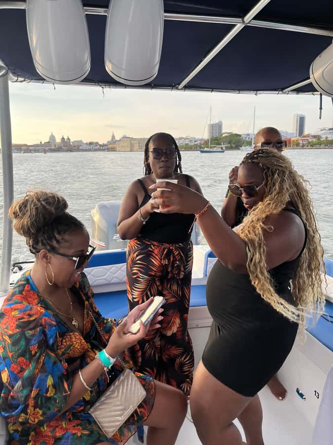 Sunset Party open bar on the bay while sharing with locals - When the cruise becomes a party