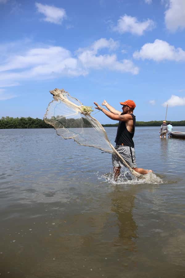 Typical lunch on beach, mangrove tour & fishing with natives - Drums, dancing, and island hospitality